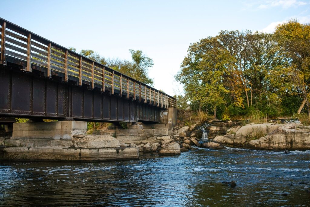 Walk bridge by dam in Cold Spring, MN